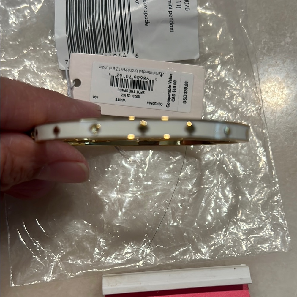 Kate spade Gold and White Bangle Bracelet